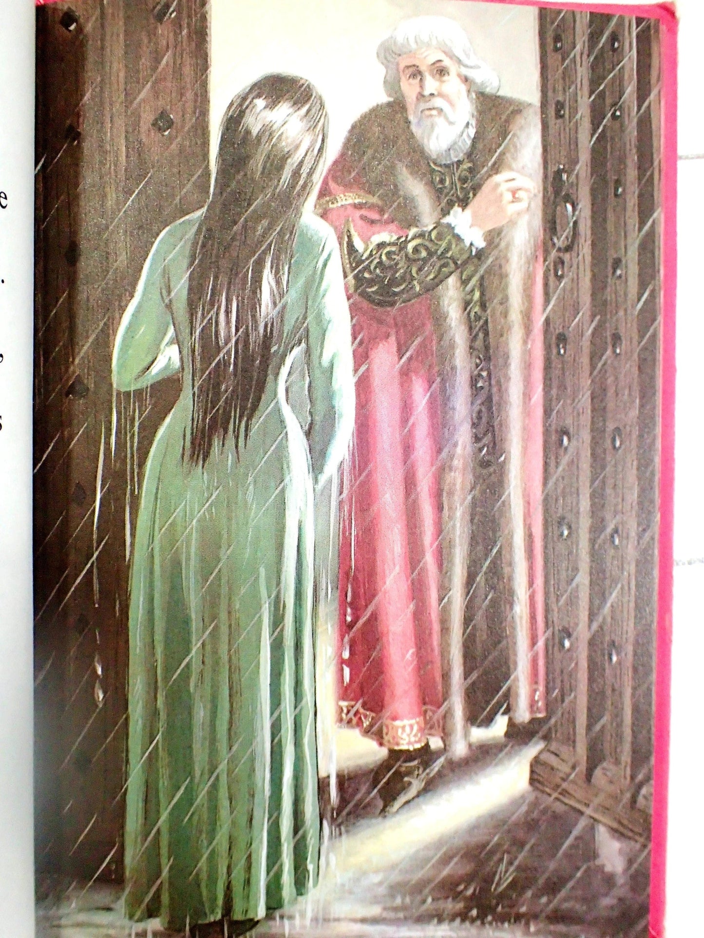 The princess at the castle door in the rain.
