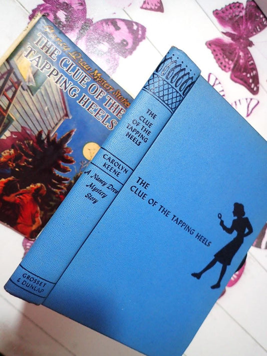The Clue of the Tapping Heels Carolyn Keene with silhouette of Nancy