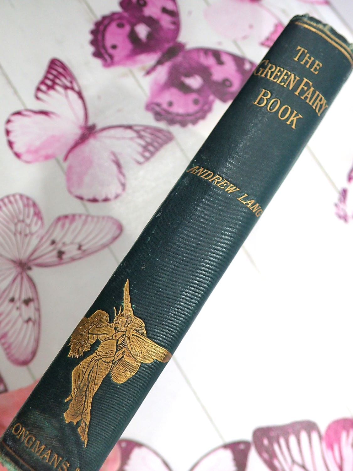 Gilt embossed spine of The Green Fairy Book by Andrew Lang Antique Edition 1895