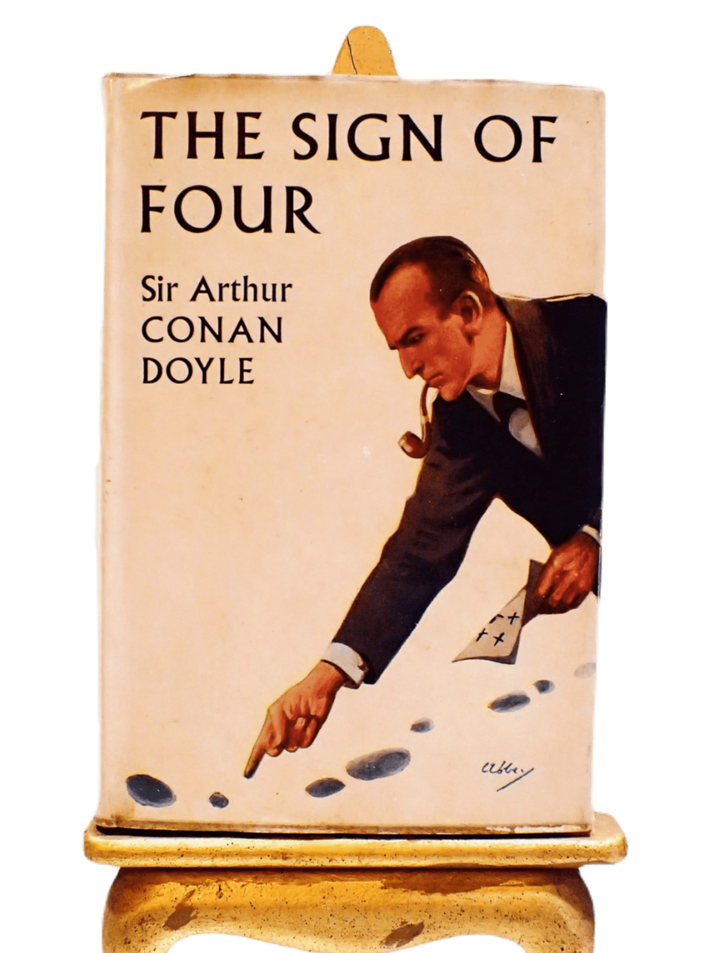 Front Cover of The Sign of the Four Arthur Conan Doyle showing the detective pointing to footsteps.