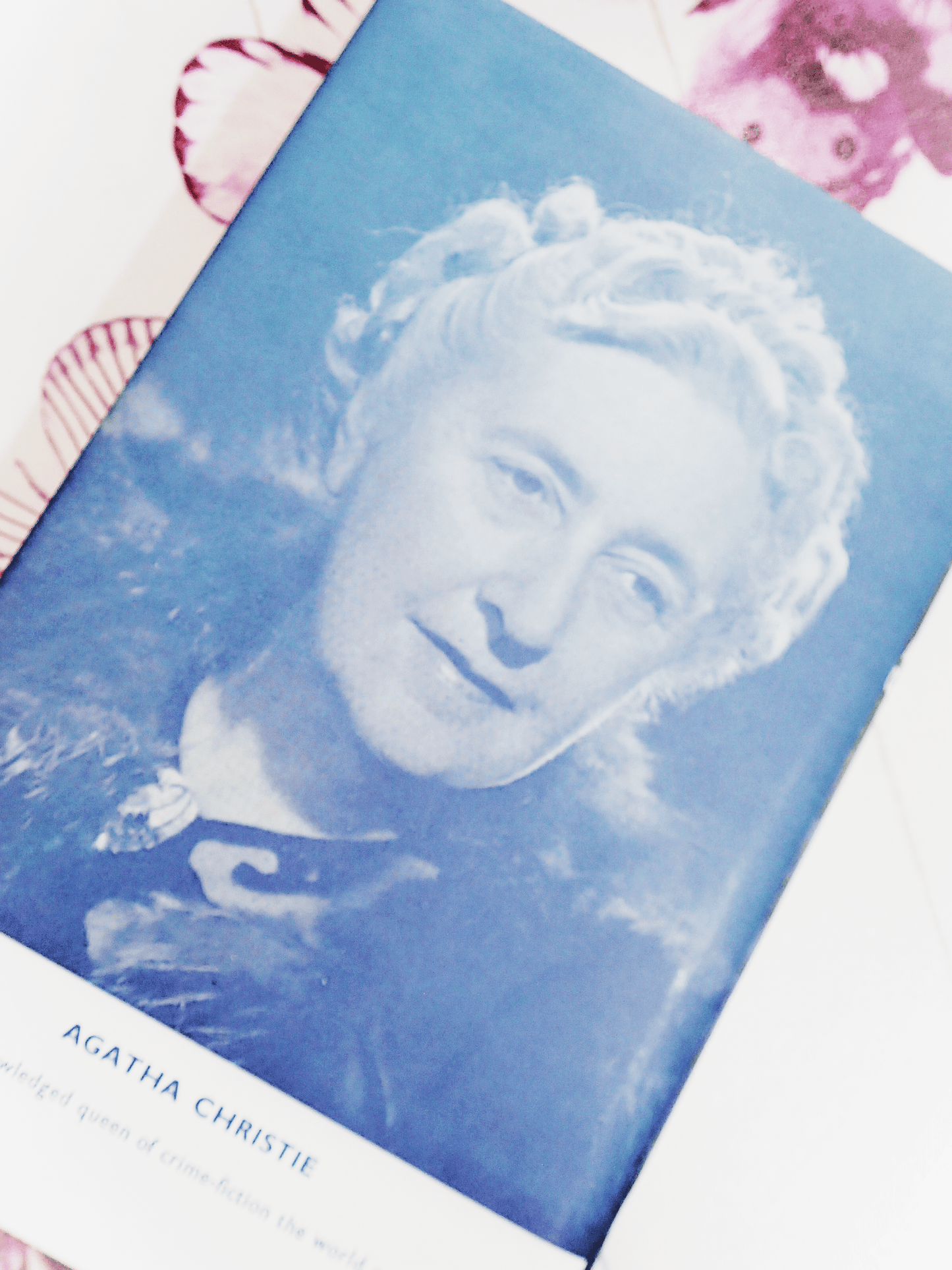 Back cover of Agatha Christie A Murder is Announced showing a black and white portrait photograph of Agatha Christie.