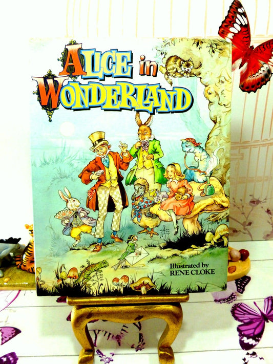 Front cover of Large Vintage Alice in Wonderland Children's book with full colour illustrations of Alice and the Cheshire Cat.