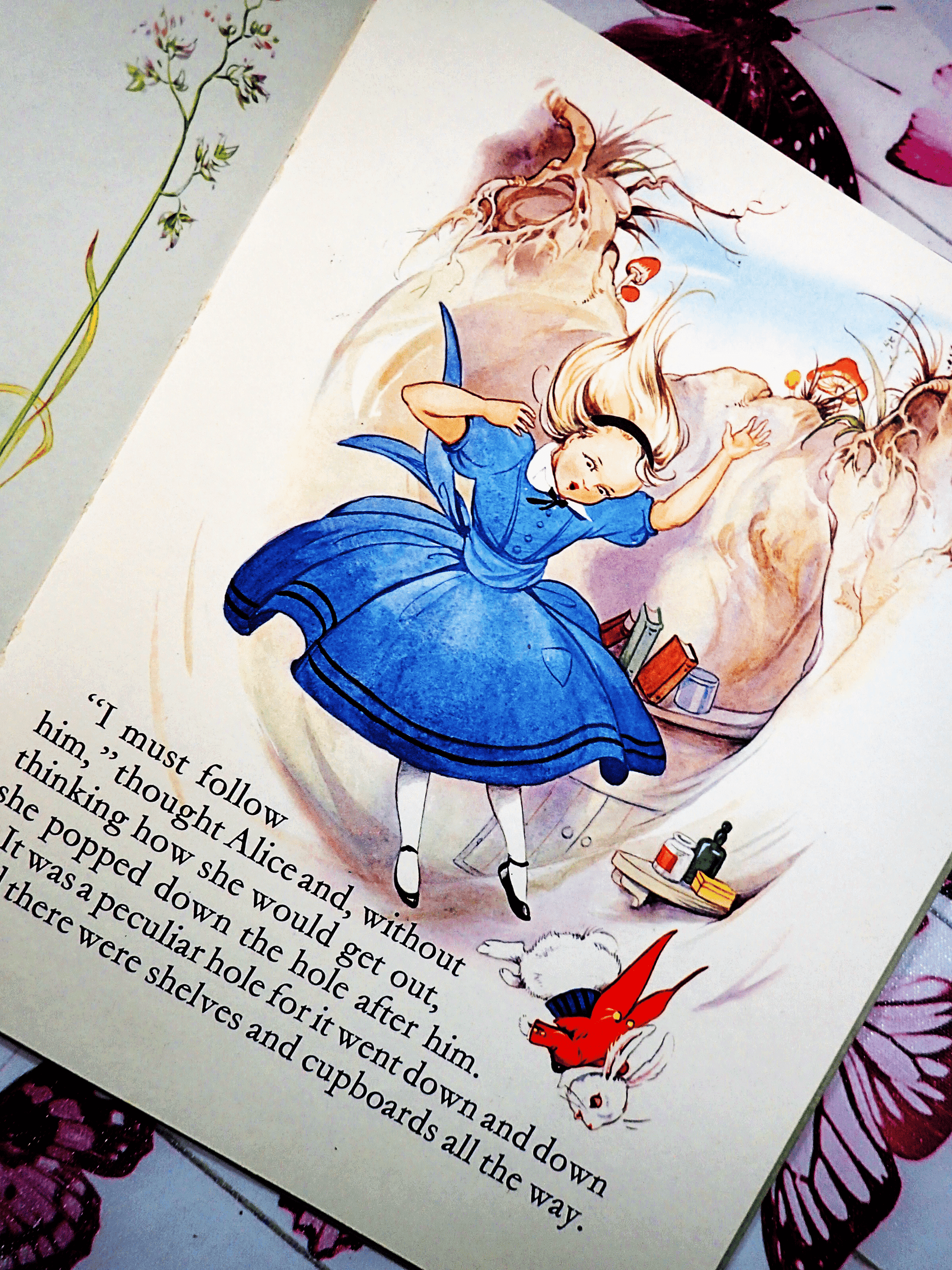 Alice falling down the Rabbit Hole in Alice in Wonderland Dean Gold Medal Book Hardback