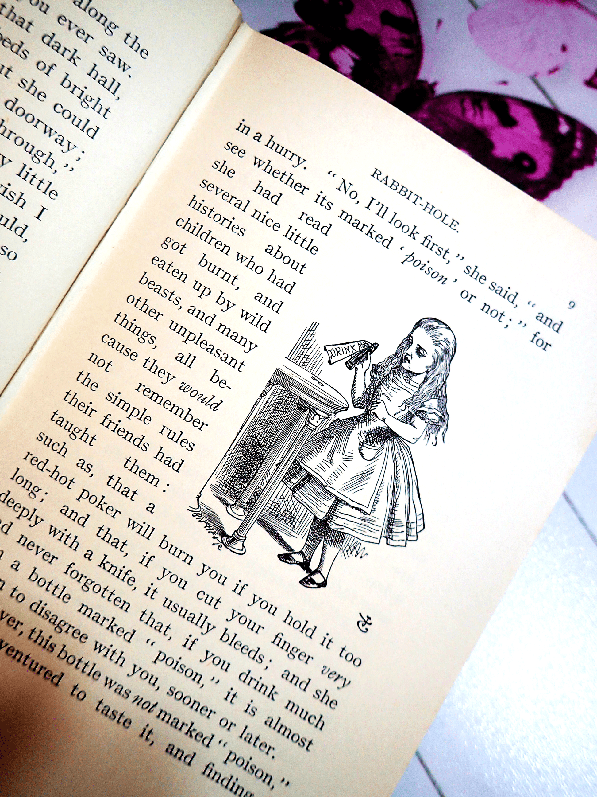 Page of Alice in Wonderland Lewis Carroll Warne Vintage Hardback Book showing Alice holding a bottle that says 'Drink Me'.