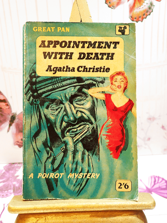 Front Cover of Appointment with Death Agatha Christie Great Pan Paperback Vintage Crime Book 1950's showing a distressed woman in Red with a giant image of a sheik with a syringe behind her.