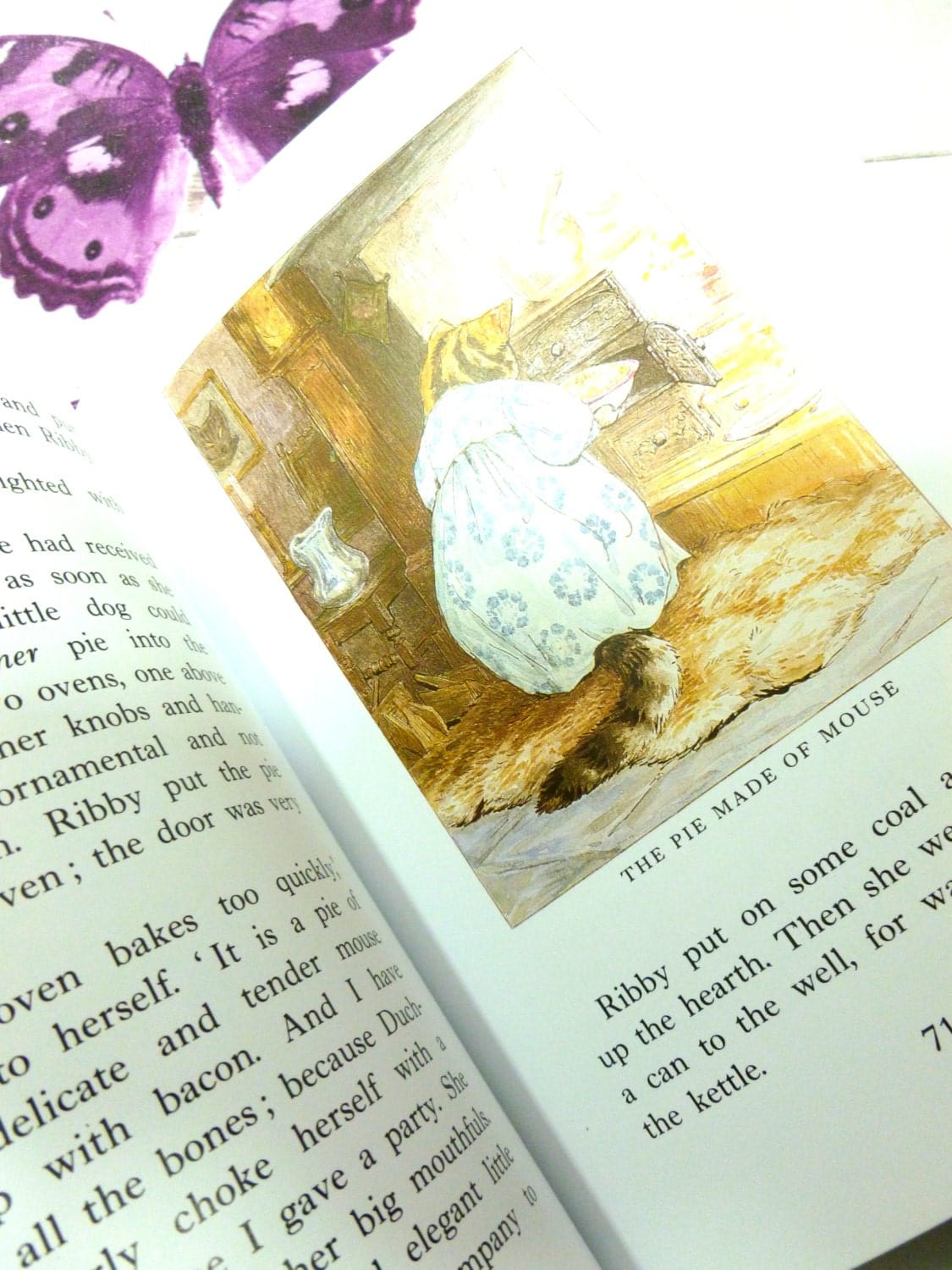 Illustrated page from Beatrix Potter Selected Tales showing Ribby the Cat putting some pies in the oven.