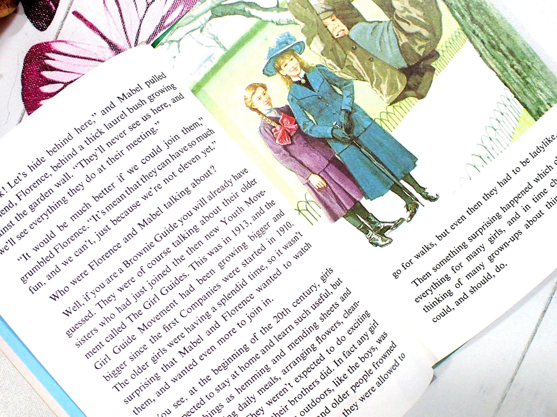 The new youth movement called the Girl Guides two girls in old fashioned dress