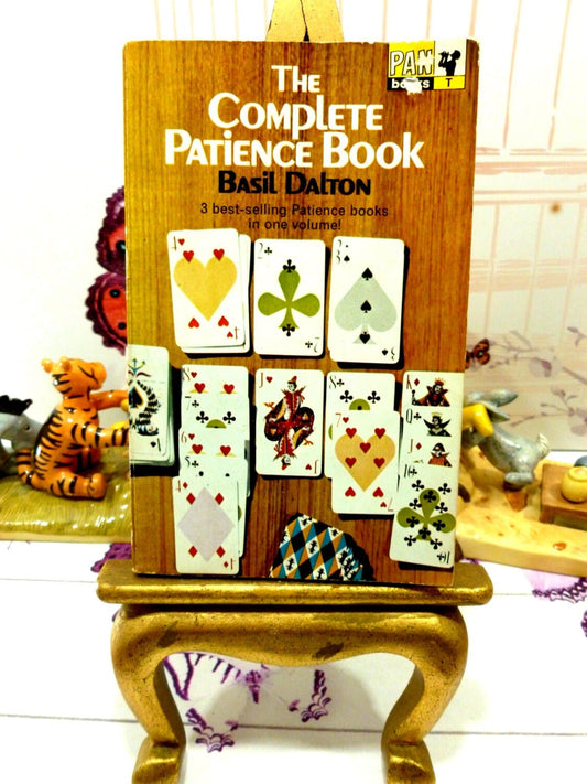 Front cover of The Complete Patience Book Basil Dalton 1960s Pan Paperback Book showing Pan logo and playing cards. 