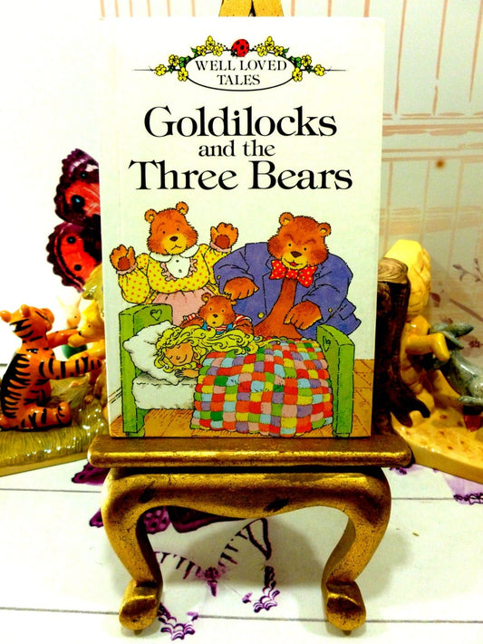 Front cover of vintage Ladybird book showing Goldilocks and the Three Bears.  Well Loved Tales for children. 