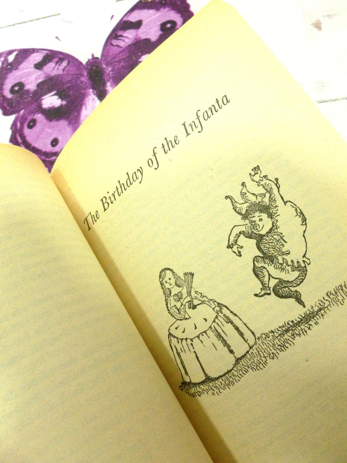 Page of The Happy Prince and other Stories Classic Childrens Book Vintage Puffin Book Paperback 1970s showing the Birthday of the Infanta.
