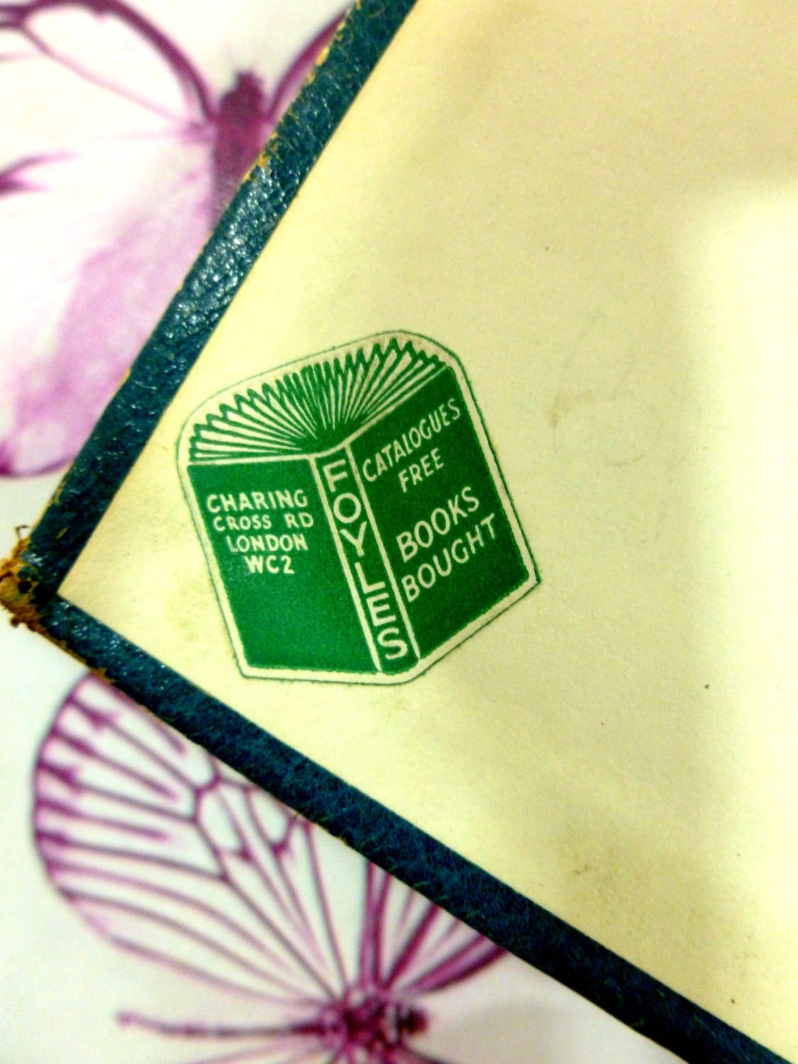 Green Antique bookseller's label for 'Foyles, Charing Cross Rd. London WC2, catalogues free books bought'.