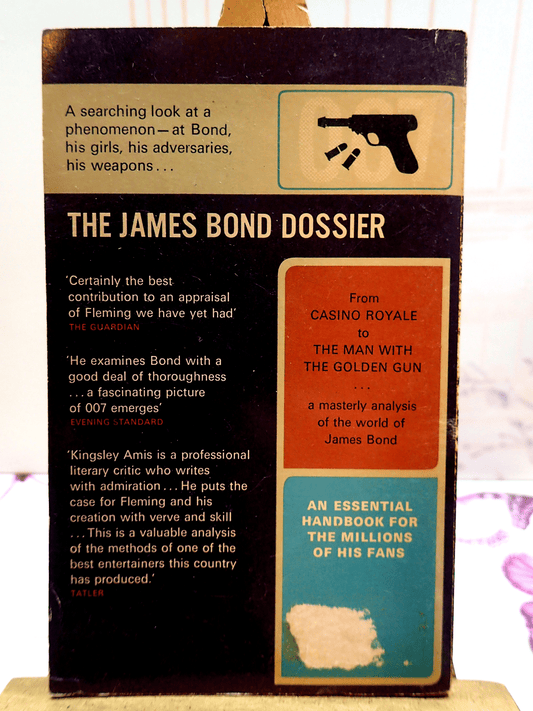 Back Cover of The James Bond Dossier Kingsley Amis Vintage Pan Paperback showing blurb and silhouette of a revolver