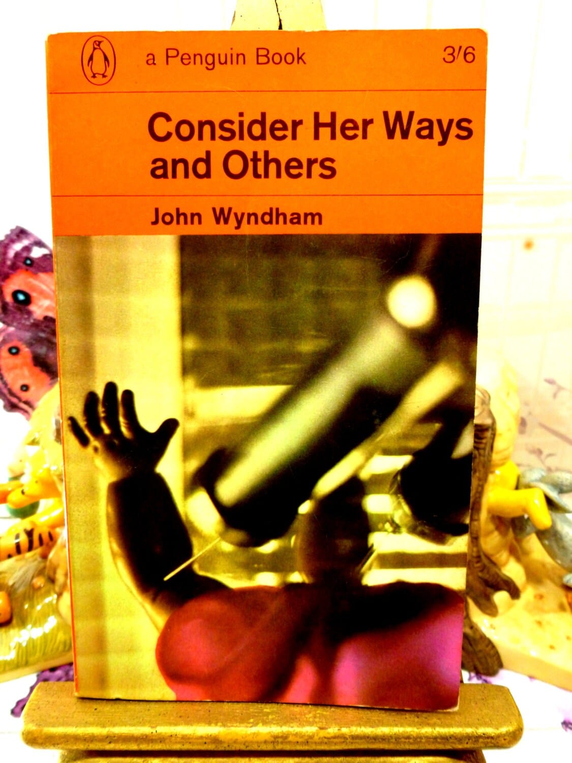 Front cover of Vintage Penguin Orange Paperback John Wyndham First Ed Book Consider Her Ways and Others showing a syringe and strange figure.