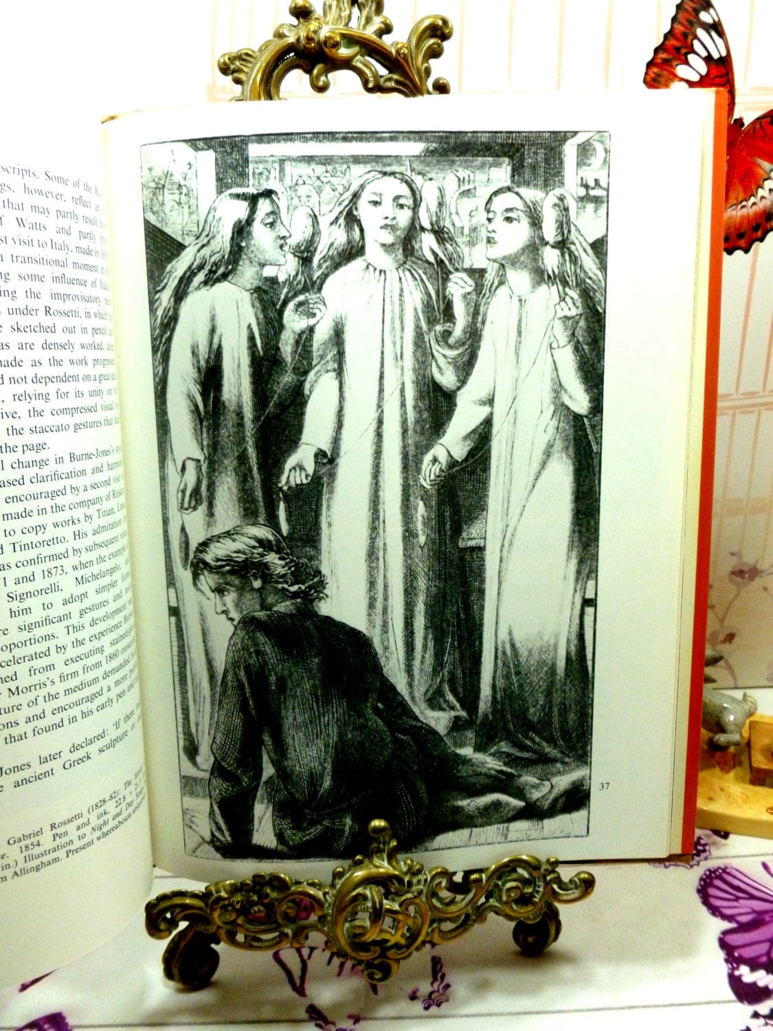 Pages from Magnificent Dreams vintage hardback book about Burne Jones and The Victorian Pre Raphaelites showing a grayscale image of a pre-raphaelite painting.