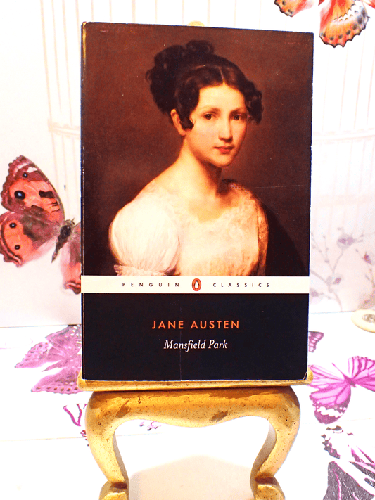 Front cover of Mansfield Park Jane Austen Penguin Classics showing a portrait of a Regency Girl with butterflies in the background. 