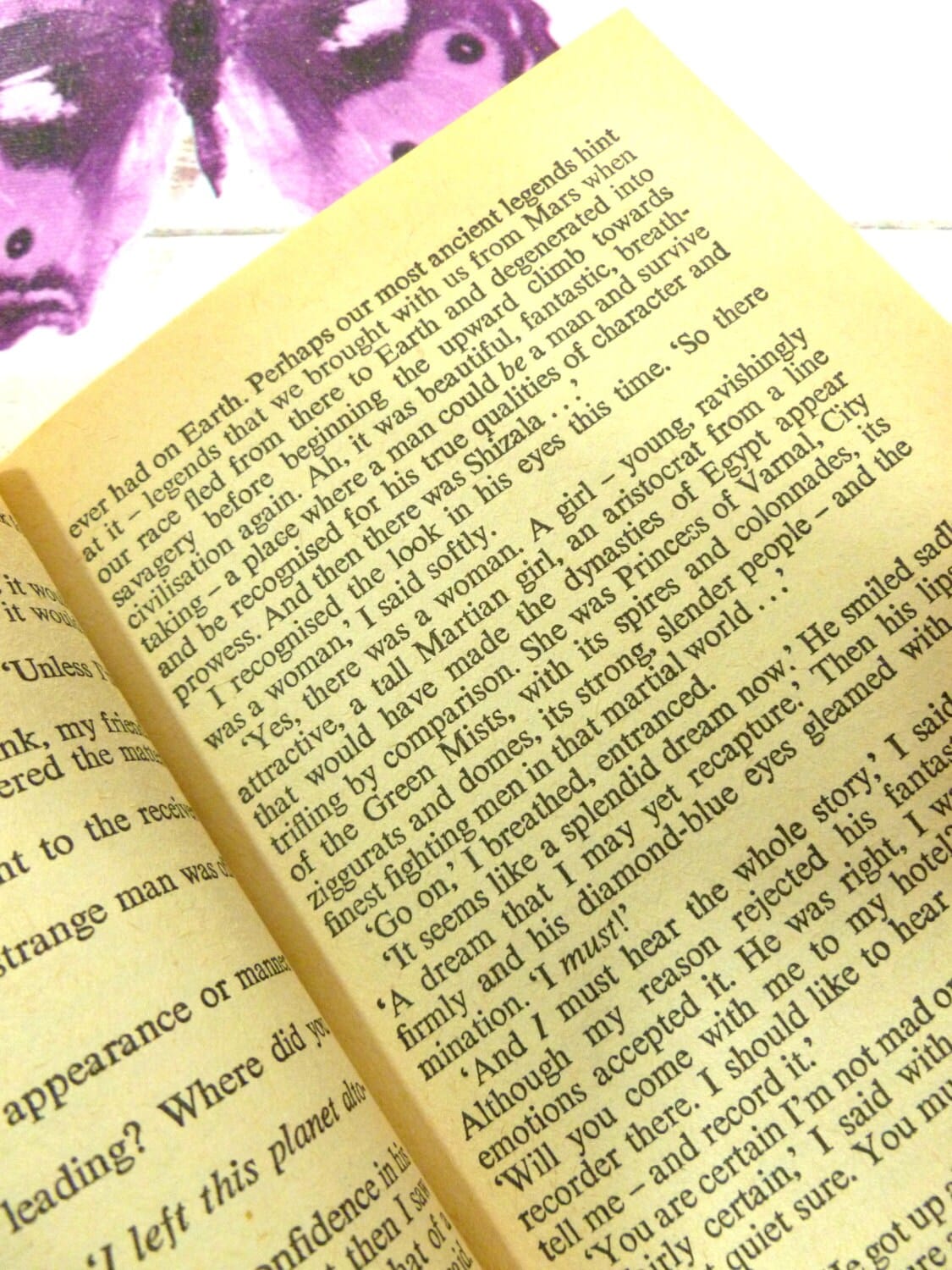 Pages showing text from Michael Moorcock Vintage Sci Fi Paperback Book 1970s City of the Beast Warriors of Mars Martian Trilogy: A girl young ravishingly attractive, a tall Martian girl...