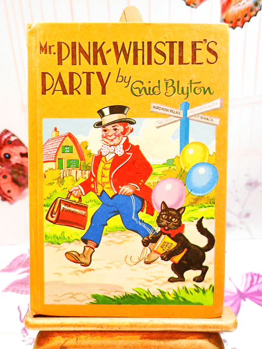 Front Cover of Mr Pinkwhistles Party by Enid Blyton Vintage Children's book 1970's Hardback Bedtime Stories showing Mr Pinkwhistle wearing a funny suit walking with his black cat. 