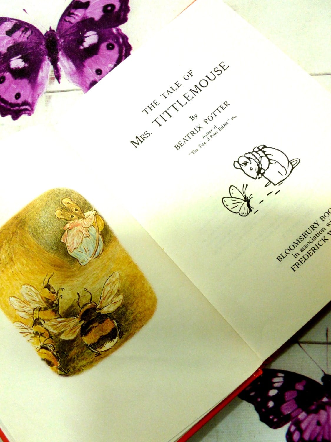 Title page and frontispiece of The Tale of Mrs TittleMouse First Edition Bloomsbury Book 1993 Beatrix Potter showing Mrs Tittlemouse with some bees.