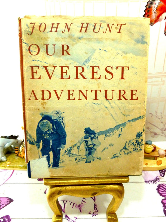 Front cover of Our Everest Adventure showing photo of Sir John Hunt and team making the climb. 