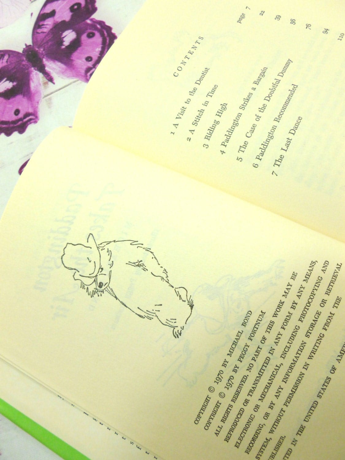 Pages from Paddington Takes the Air Vintage Book First American Edition showing Paddington Bear line drawn illustration and contents.