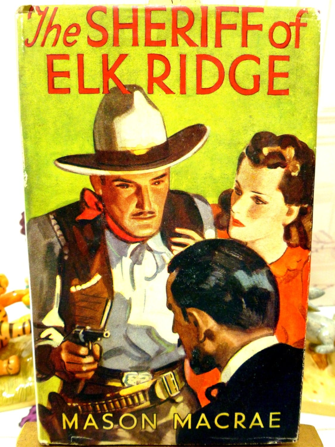 Front cover of book showing the Sheriff of Elk Ridge by Mason Macrae 1st Edition Cowboy Western Pulp Fiction Hardback 1930s Classic Tale of the Old West.