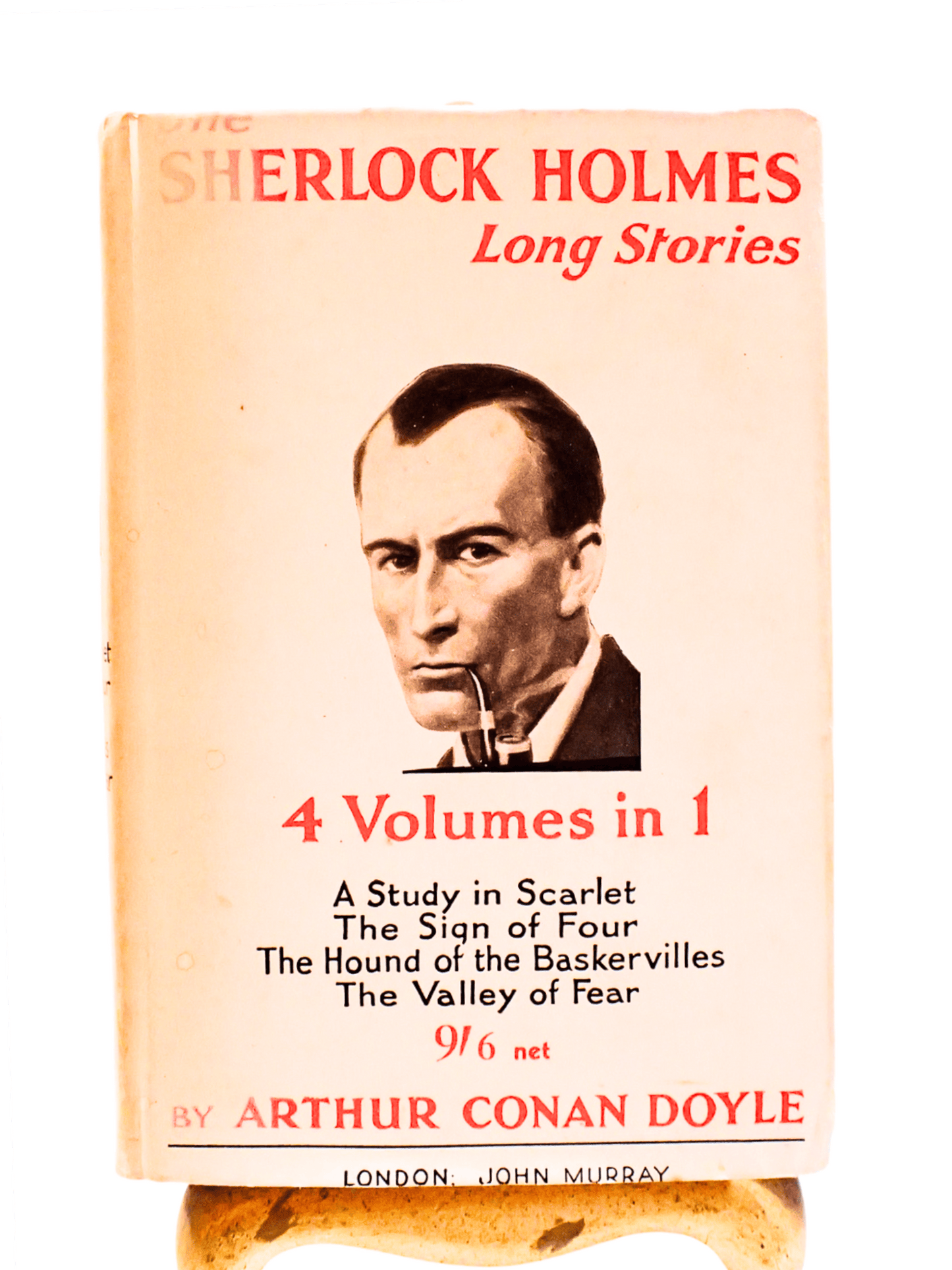 Front cover of Sherlock Holmes Long Stories Arthur Conan Doyle Showling Sherlock smoking a pipe.