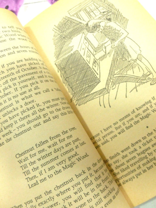 Page of The Stream that Stood Still Beverley Nichols Childrens Classic Vintage Fontana Lions Paperback showing a girl at a desk.