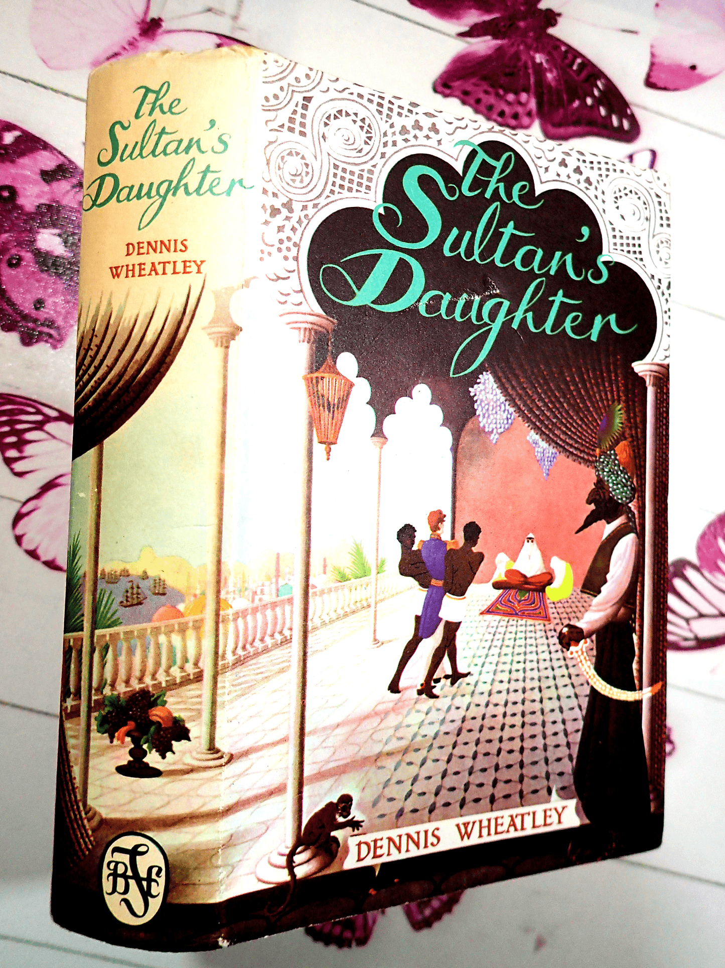Front cover of The Sultans Daughter Dennis Wheatley Vintage Book BCA Showing a man in a turban and a monkey.