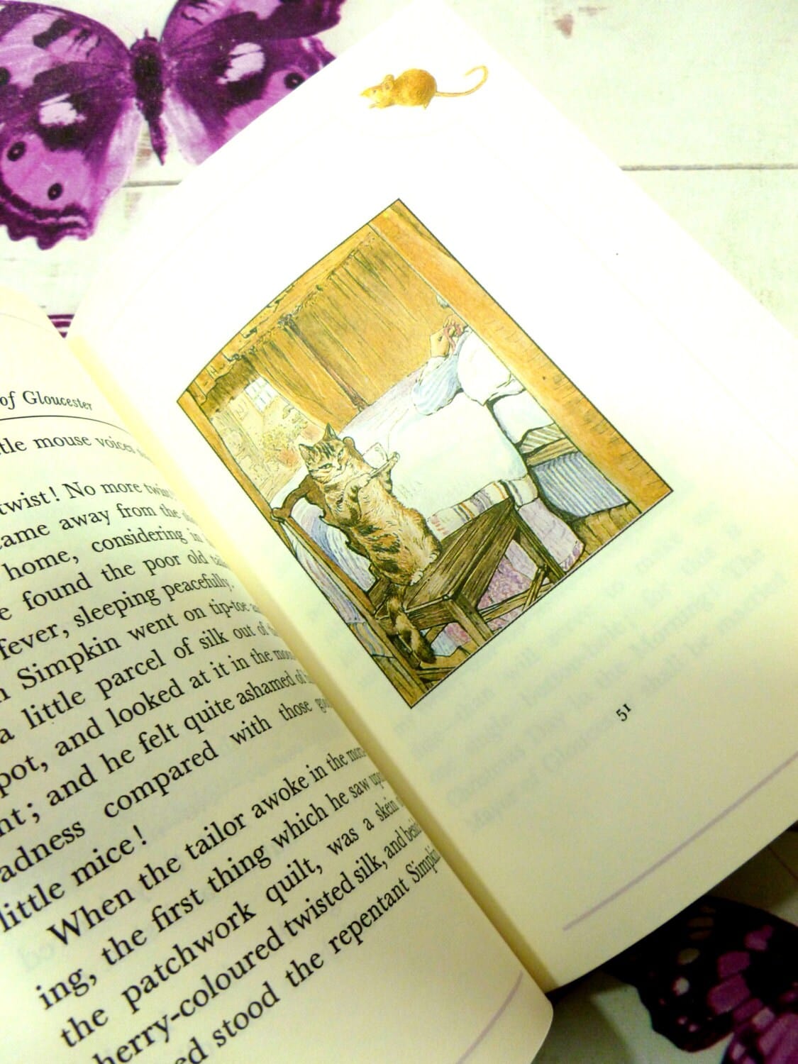 Page of The Tailor of Gloucester First Edition Purple Bloomsbury Book 1993 Beatrix Potter Childrens Story showing the cat Simpkin.