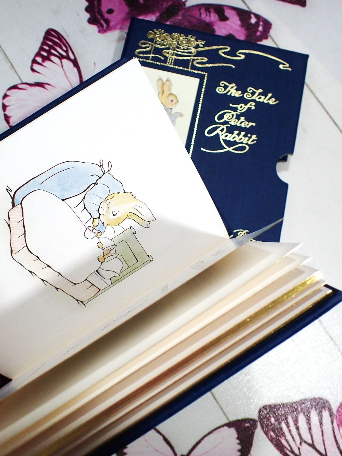 Mrs Rabbit in a Vintage Children's Book The Tale of Peter Rabbit by Beatrix Potter Luxury Centenary Gift Edition