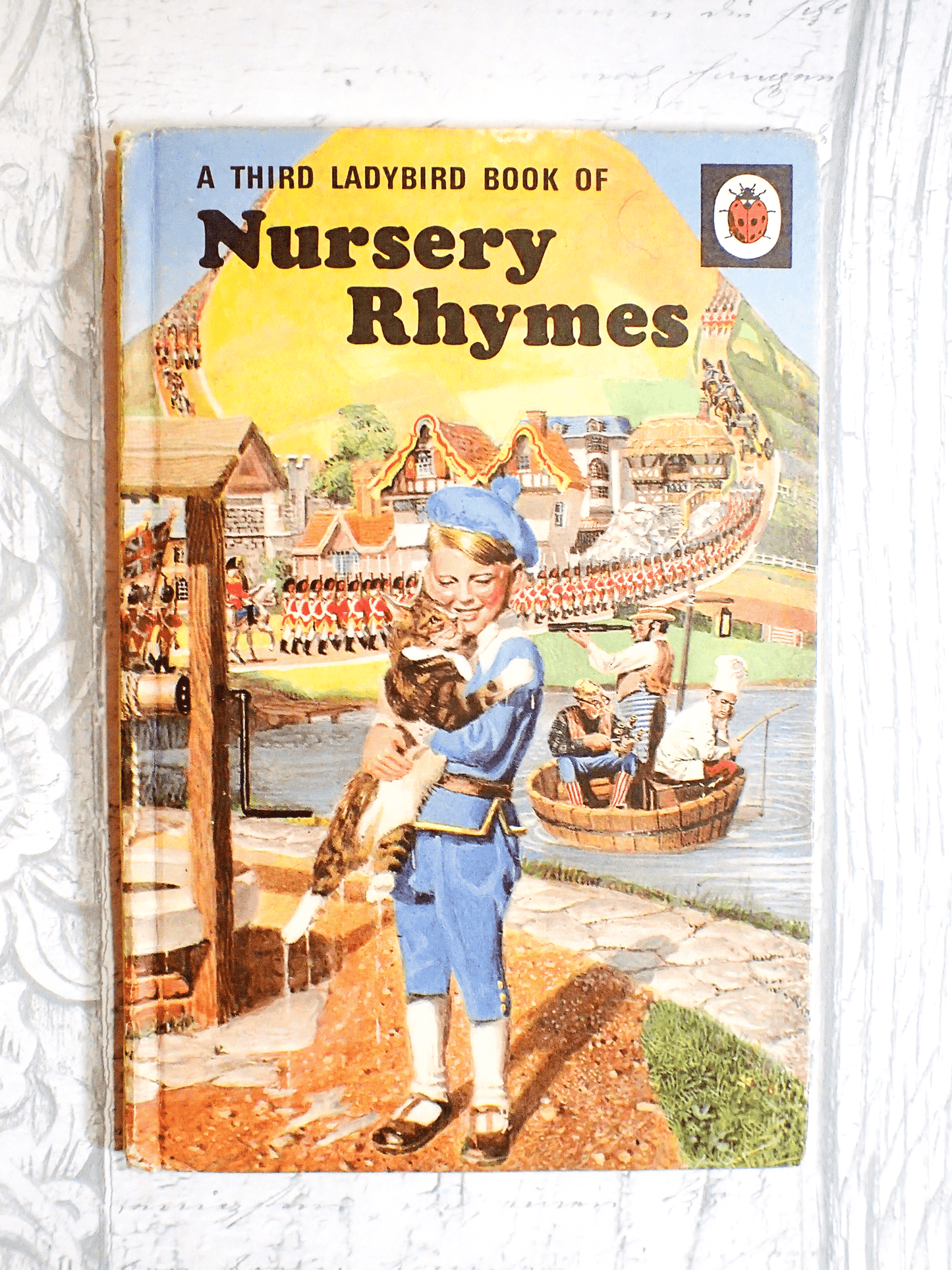 Children's Ladybird book of Nursery Rhymes against pale grey background.