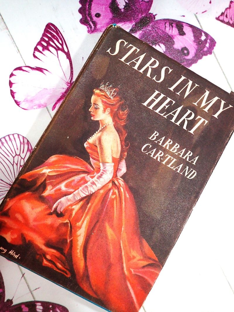Old Romance books and novels romantic couple on the cover.