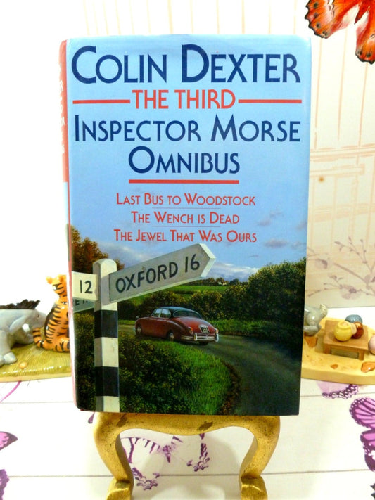 Third Inspector Morse Omnibus signed by Colin Dexter with Jaguar and signpost to Oxford on the cover. 