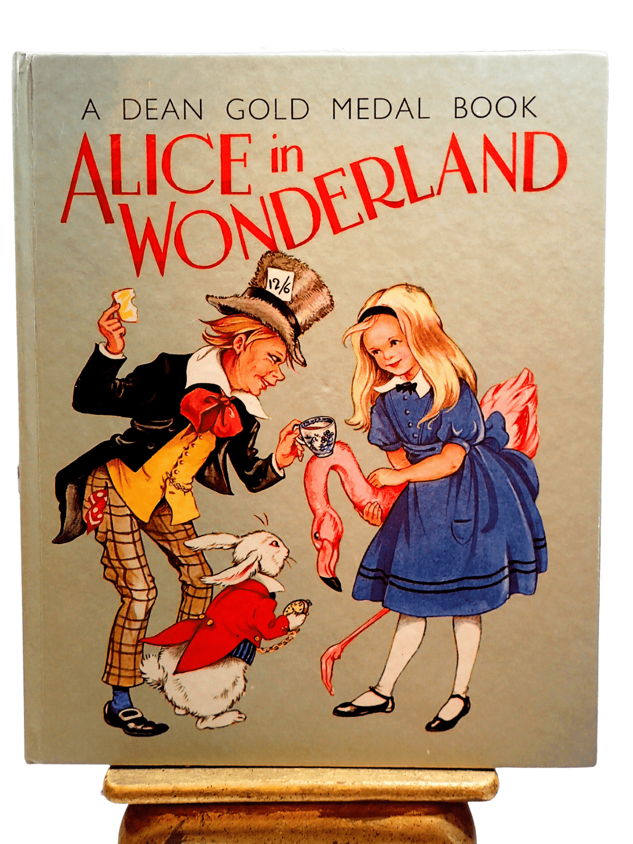 The Mad Hatter, White Rabbit and Alice on the Front cover of Alice in Wonderland Dean Gold Medal Book Hardback