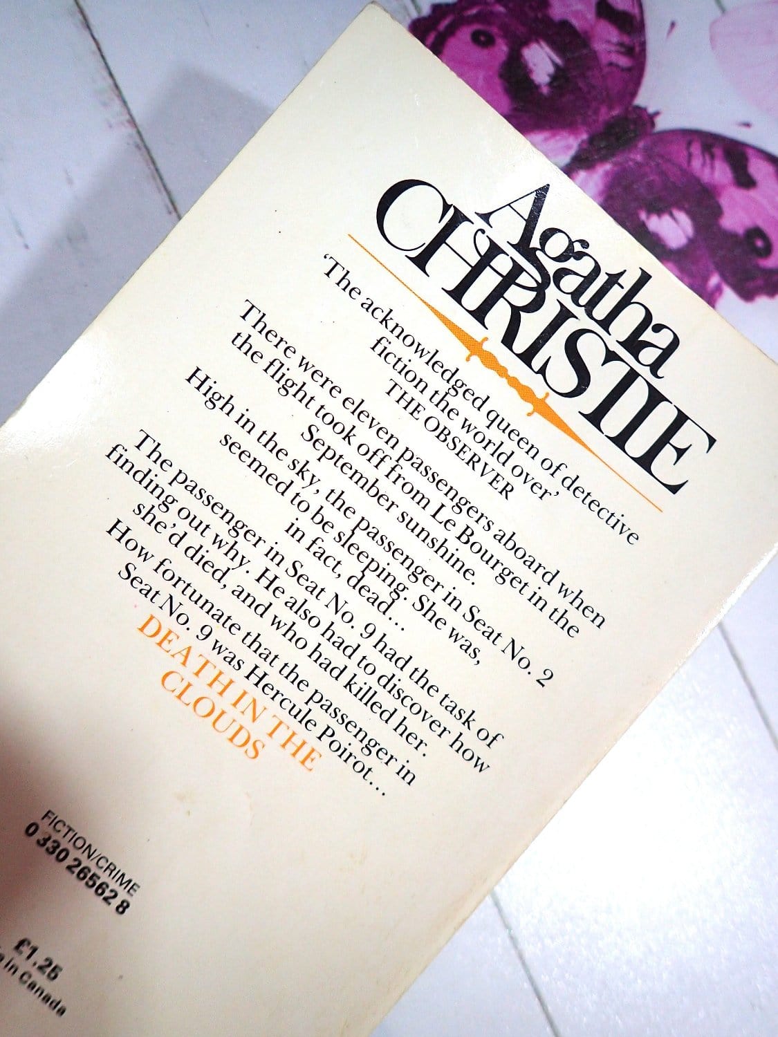 Back text Blurb of Vintage Pan Paperback Death in the Clouds Agatha Christie