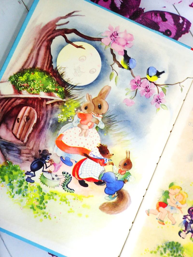 Cute Bunnies and Woodland Animals on endpapers of Willy Schermele Fairyland