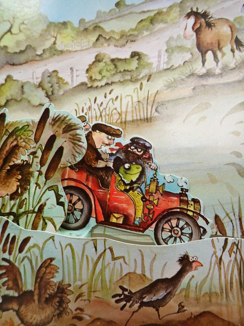 Mr Toad and his car going for a splash