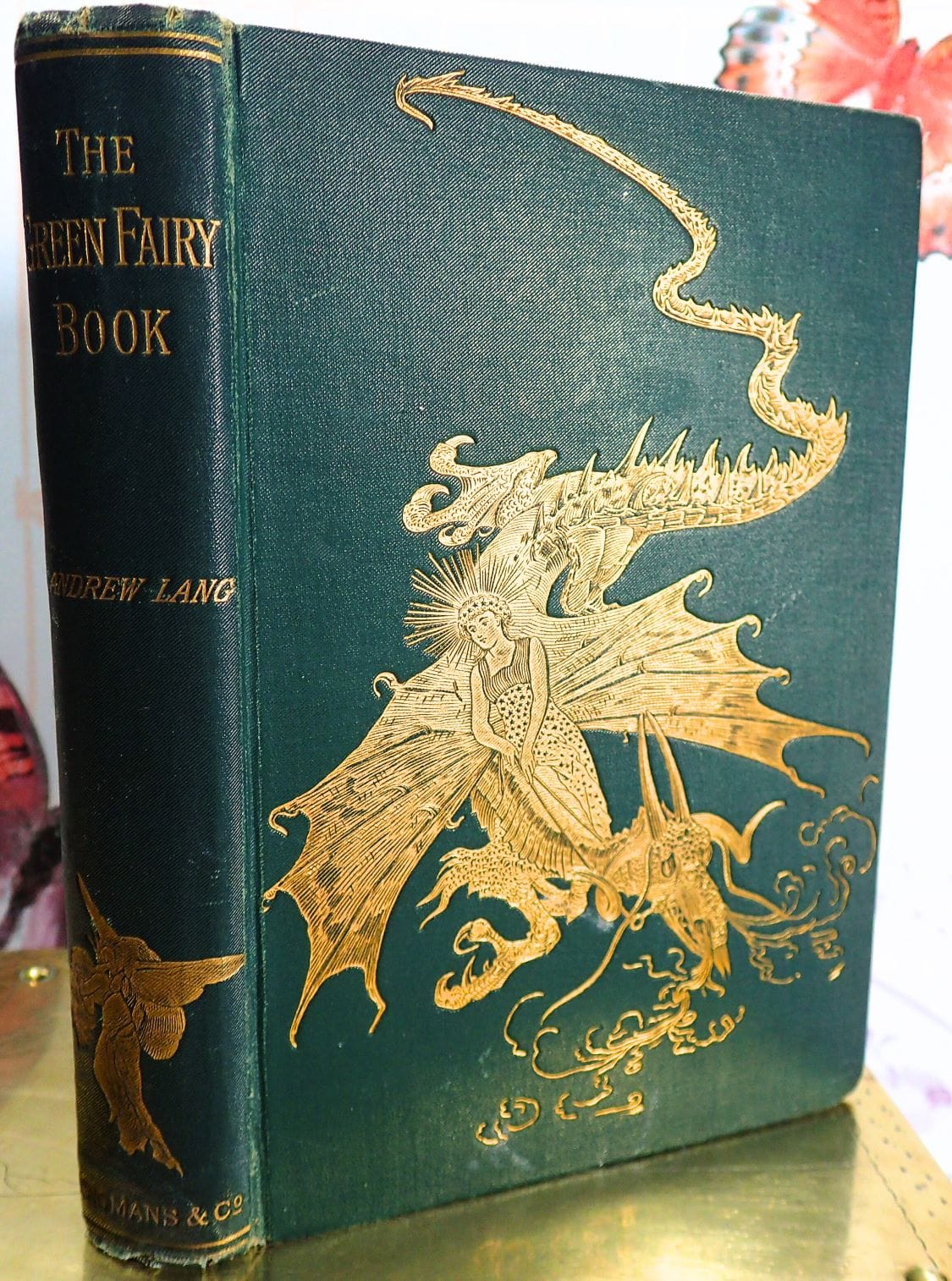 The Green Fairy Book by Andrew Lang Antique Edition 1895 with golden dragon on the front cover. 