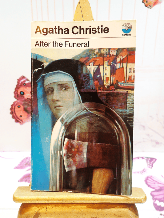 Front cover of After the Funeral by Agatha Christie Vintage Paperback Book Crime Classic 1970's, showing a Nun with an axe against a setting of quaint cottages. 