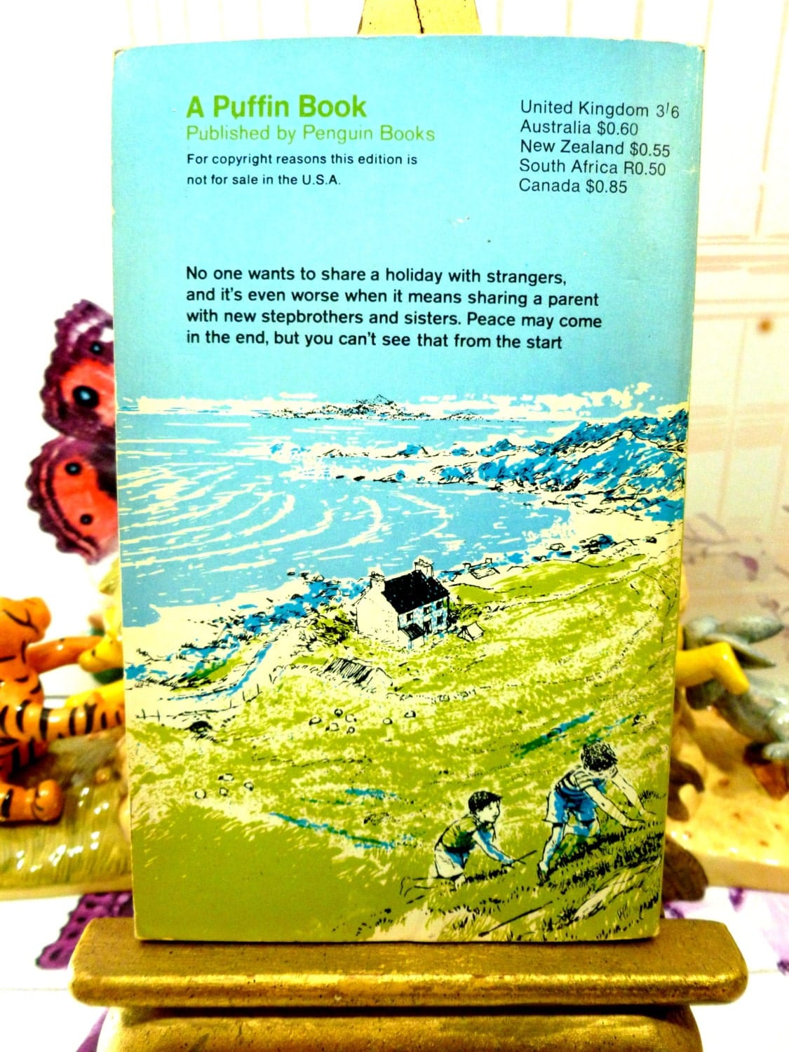 Back cover of The Battle of Wednesday Week Sweet Childrens Classic Vintage Puffin Book Paperback 1960s First Edition showing text: No one wants to share a holiday with strangers...