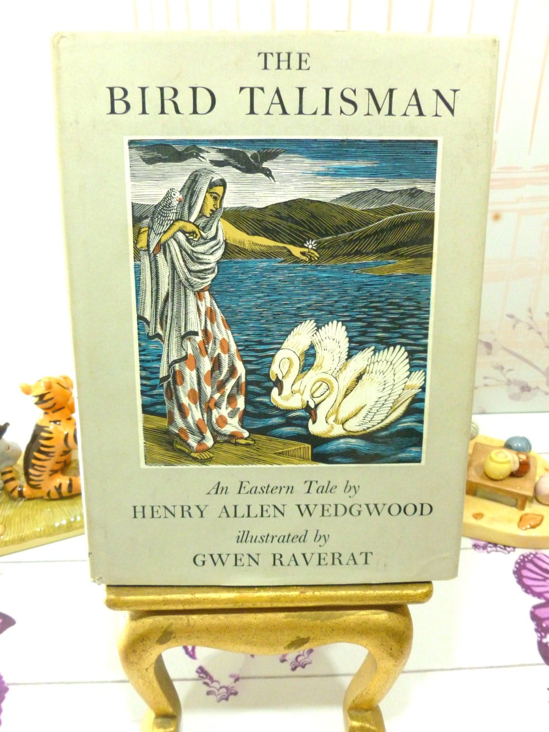 Front cover of The Bird Talisman H.A. Wedgwood and Darwin Family Interest Vintage Bird Fairytale Book showing lady in Saree and Swans. 