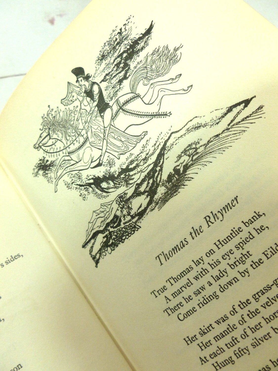 Illustration of man riding a horse carrying off a woman and words to ballad, Thomas the Rhymer. 