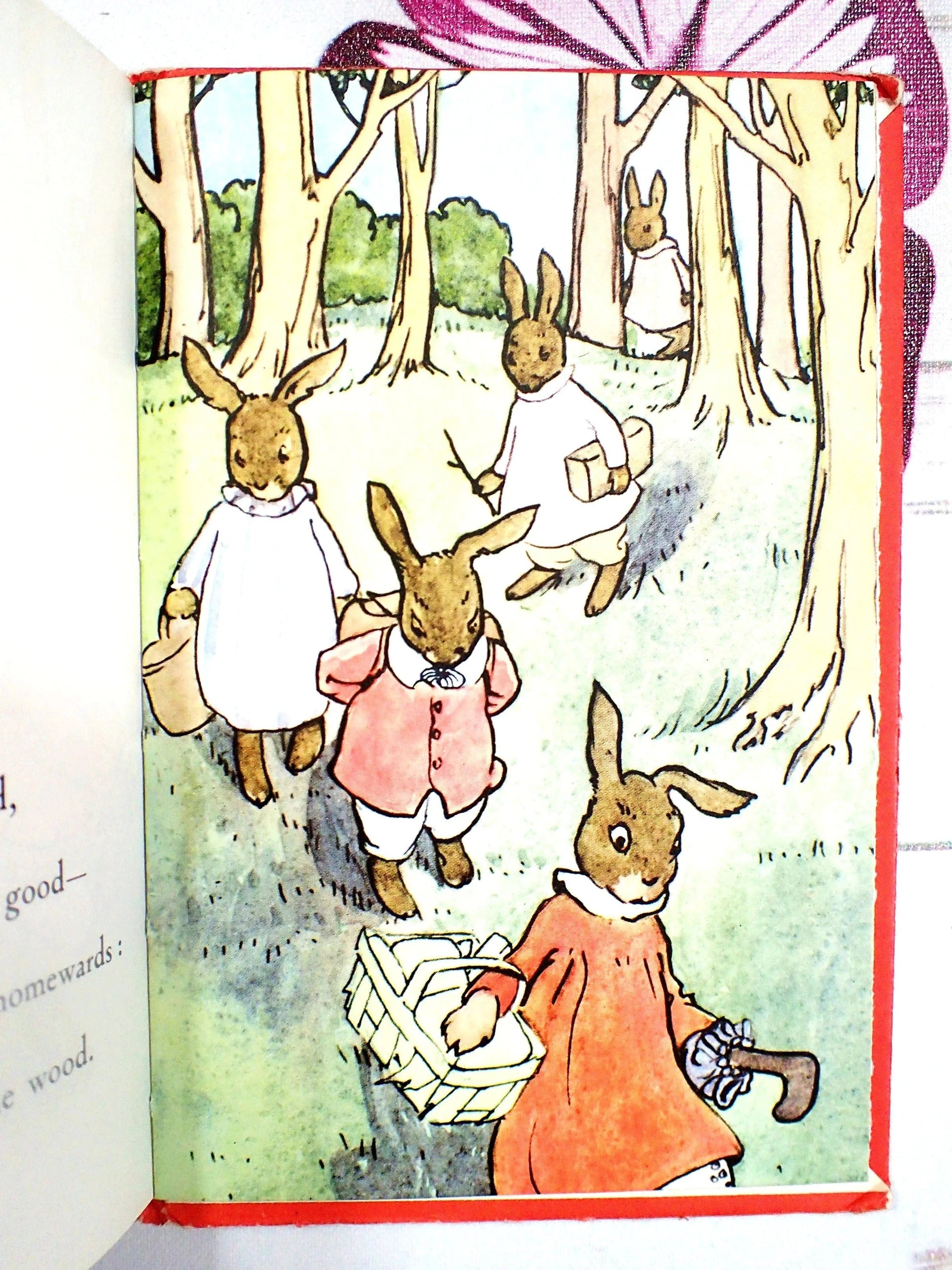 The bunnies are walking through the forest to a picnic.