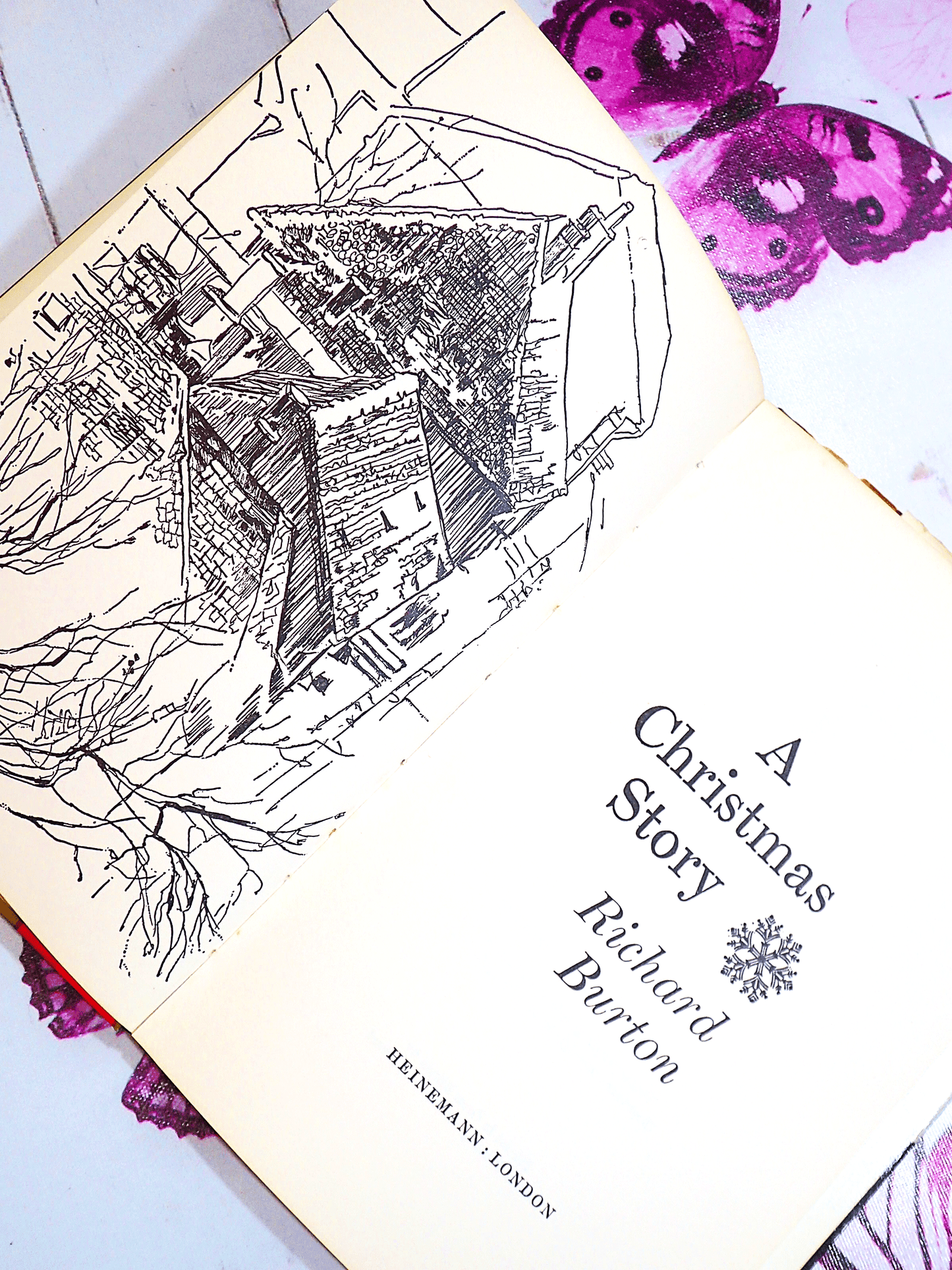 Title Page with text 'A Christmas Story by Richard Burton', and line drawn illustration of Miner's Cottages in Wales. 