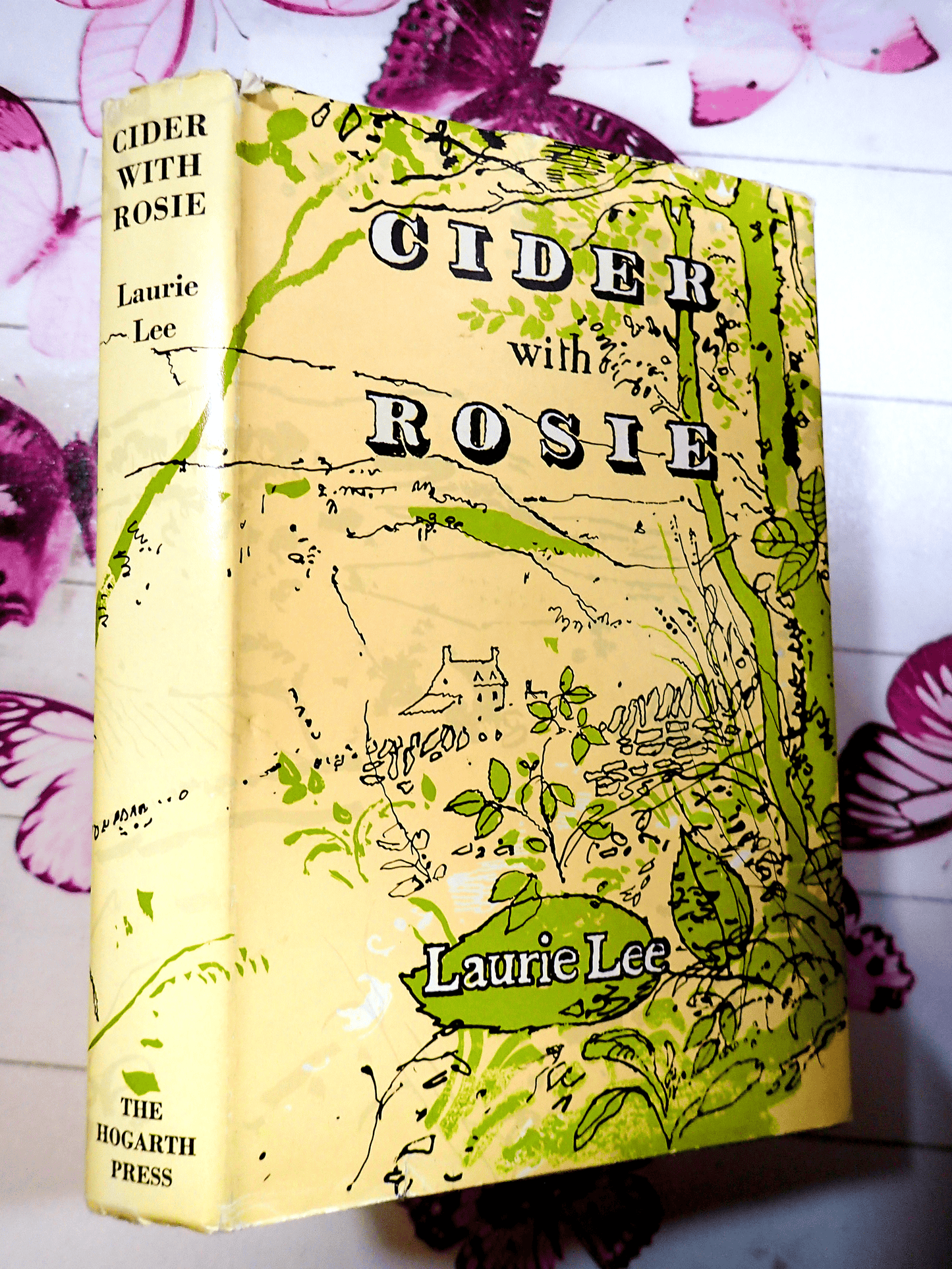 Yellow and Green Rural scene on front cover of Cider With Rosie Laurie Lee Vintage Hardback Book Bodley Head 1978