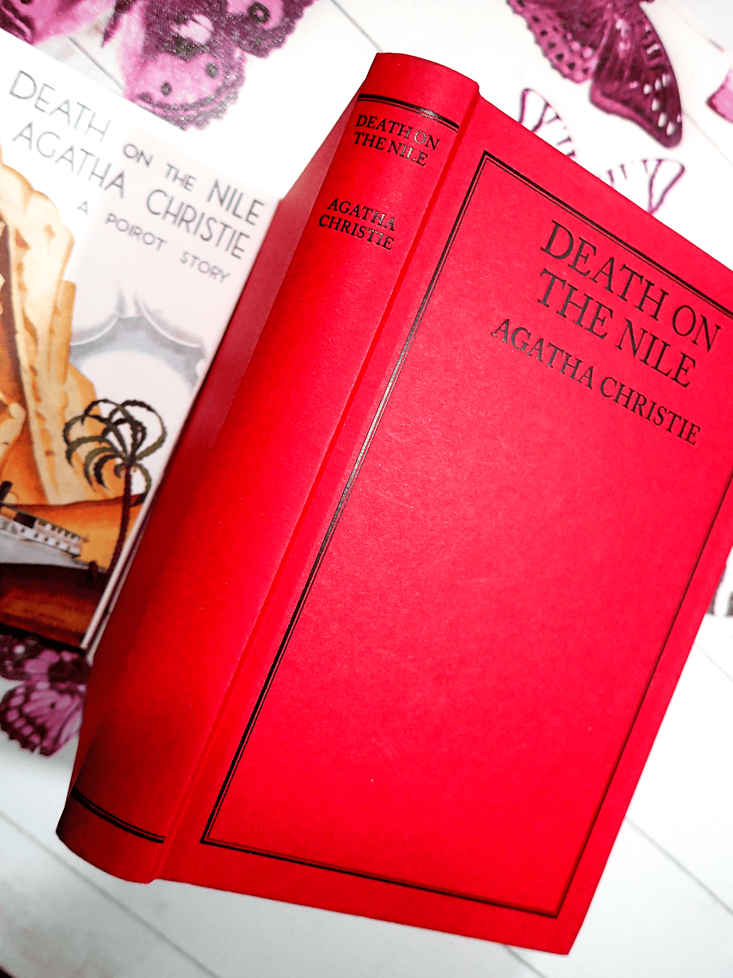 Scarlet binding and black titles of Death on the Nile Agatha Christie Crime Club Facsimile