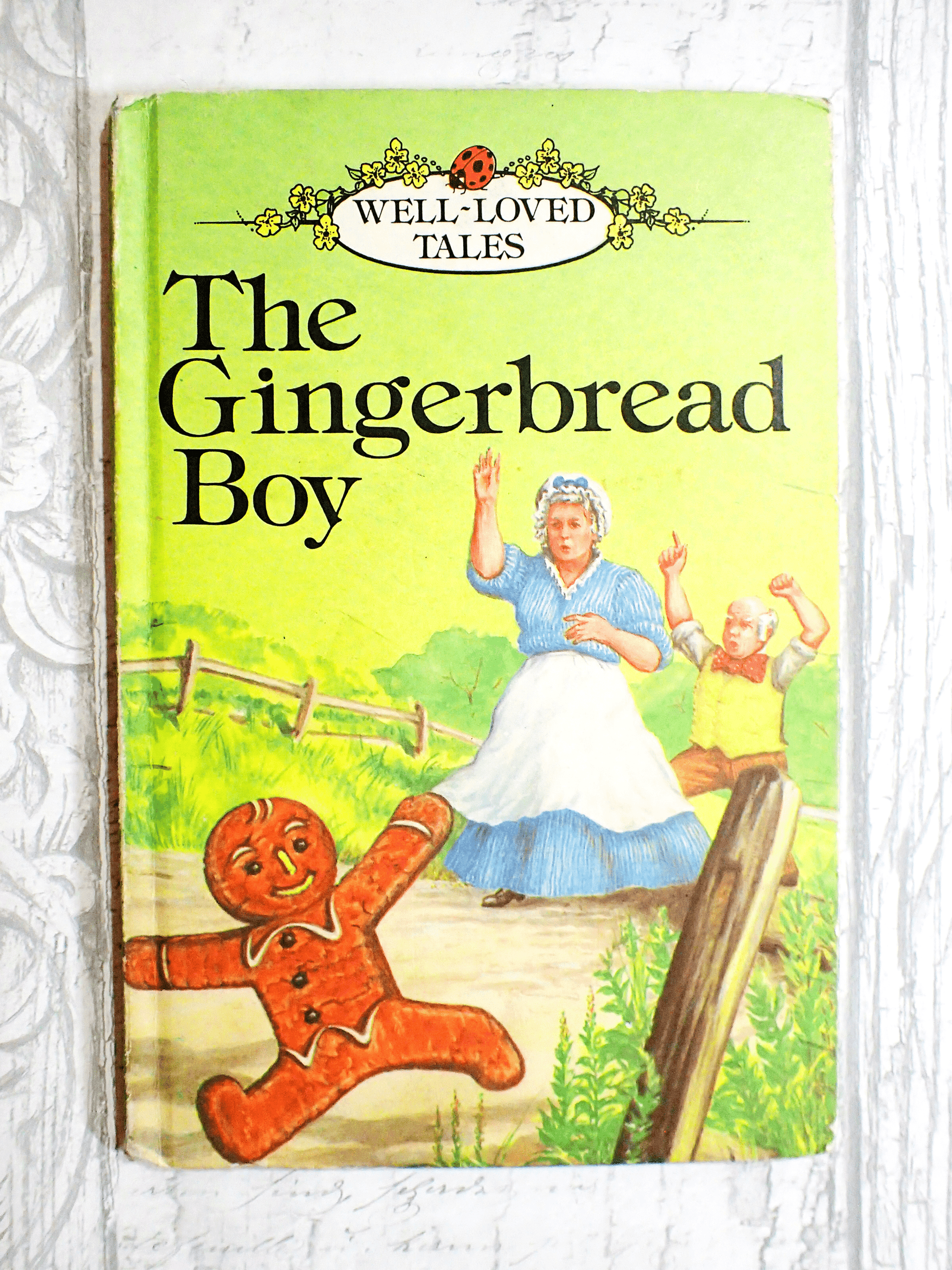Vintage Ladybird Children's book The Gingerbread Boy against pale grey background. 