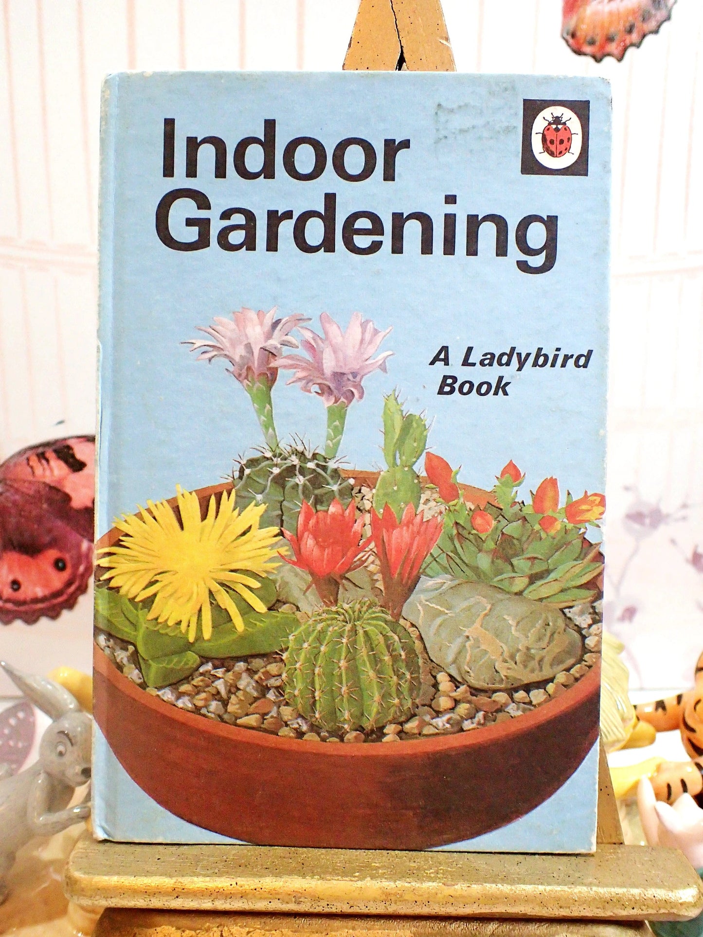 A ladybird book Indoor Gardening with cacti on the front. 