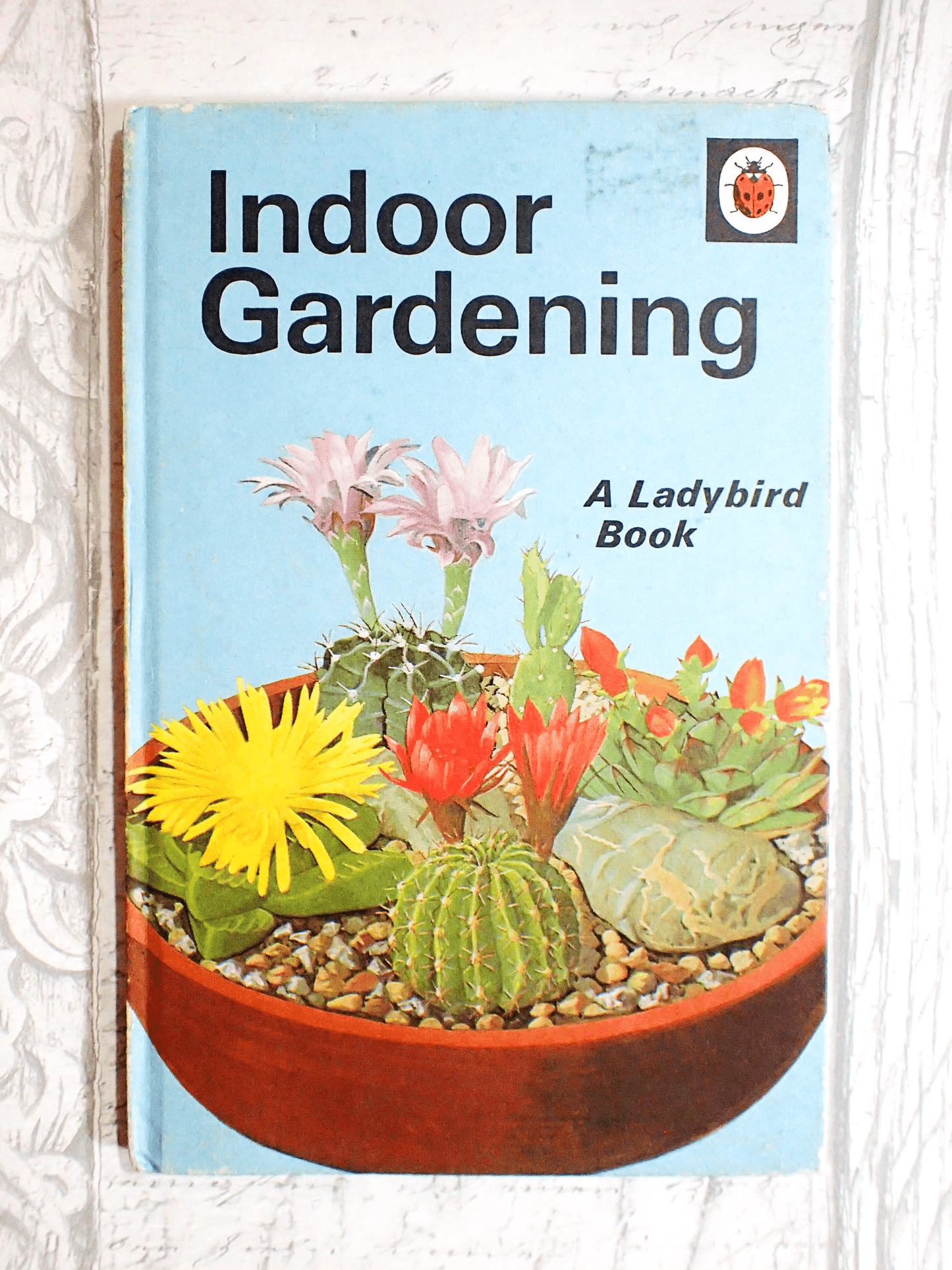 Indoor Gardening A Ladybird book against pale grey background. 