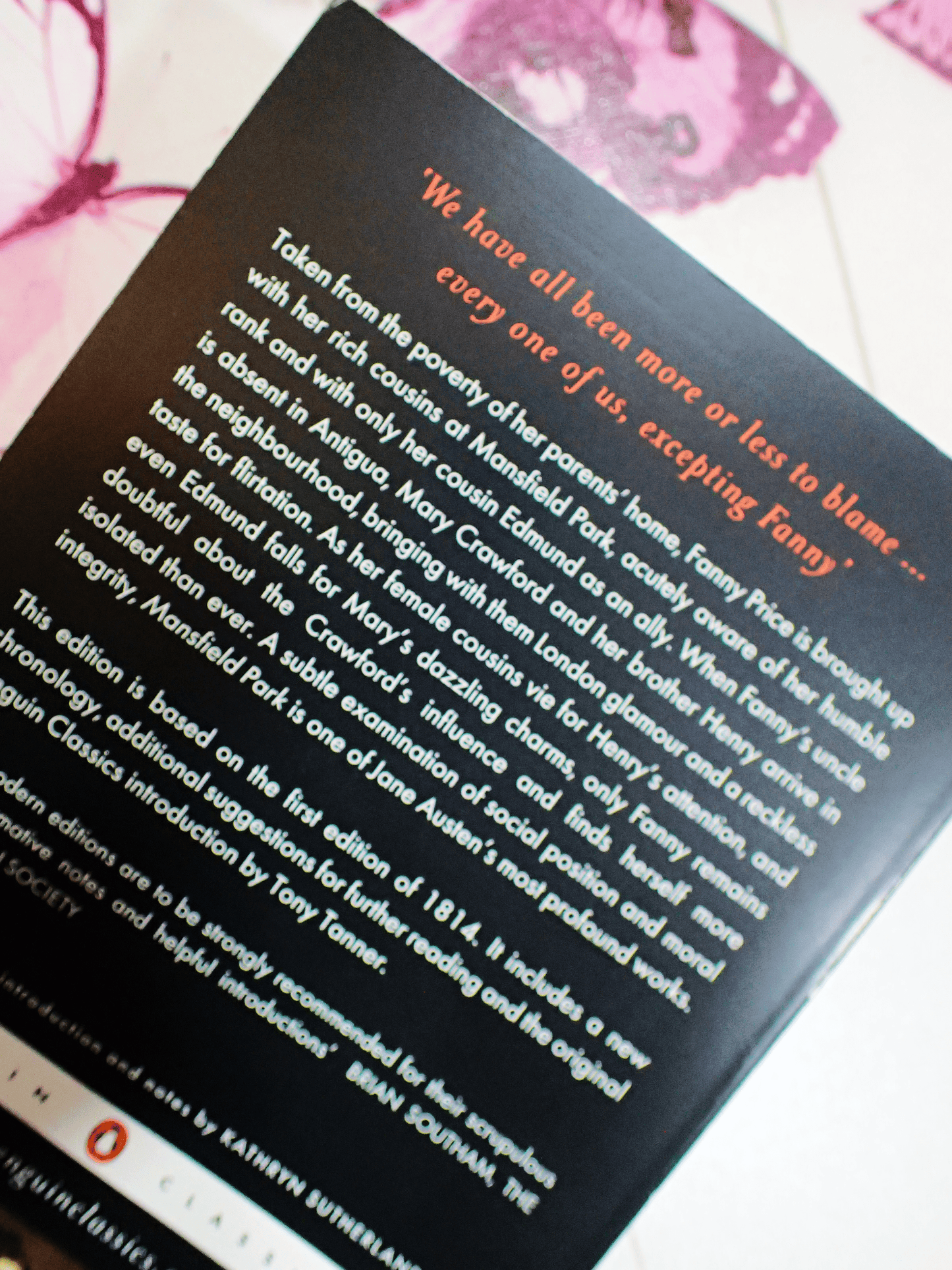 Back cover of Mansfield Park Jane Austen Penguin Classics showing information about the novel. "We have all been more or less to blame, every one of us, excepting Fanny."